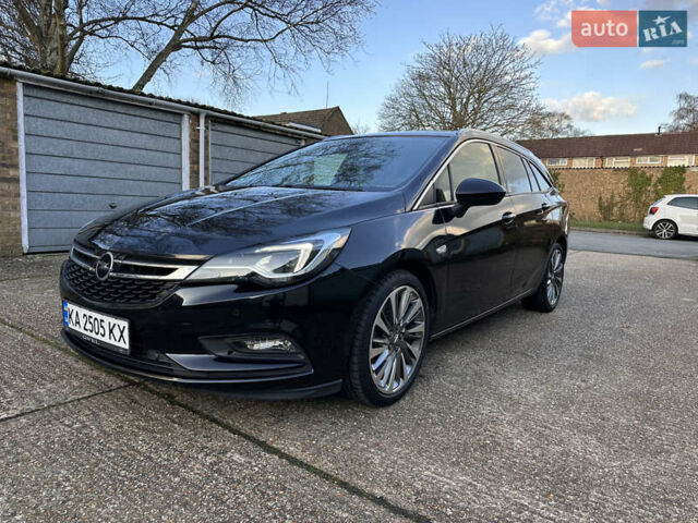 Черный Опель Астра, объемом двигателя 1.6 л и пробегом 142 тыс. км за 12000 $, фото 1 на Automoto.ua