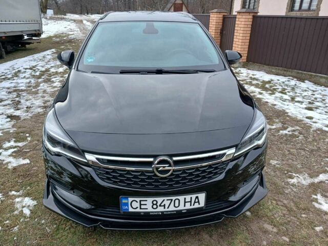Черный Опель Астра, объемом двигателя 1.6 л и пробегом 65 тыс. км за 13000 $, фото 1 на Automoto.ua