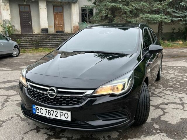 Черный Опель Астра, объемом двигателя 1.6 л и пробегом 170 тыс. км за 11500 $, фото 1 на Automoto.ua