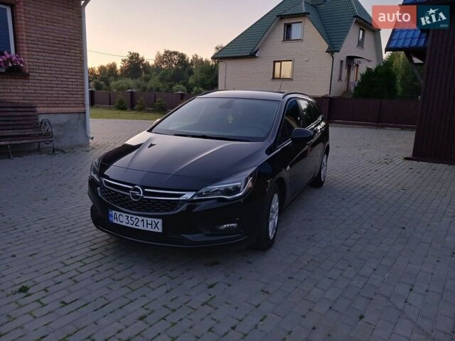 Черный Опель Астра, объемом двигателя 1.5 л и пробегом 265 тыс. км за 11900 $, фото 1 на Automoto.ua