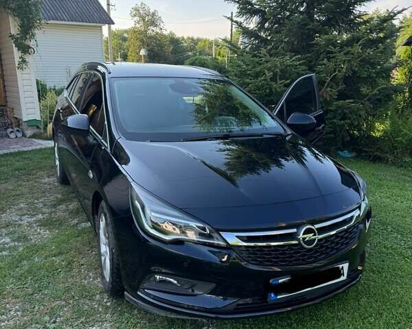Черный Опель Астра, объемом двигателя 1.6 л и пробегом 189 тыс. км за 11000 $, фото 1 на Automoto.ua