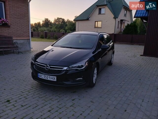 Черный Опель Астра, объемом двигателя 1.5 л и пробегом 265 тыс. км за 8900 $, фото 1 на Automoto.ua