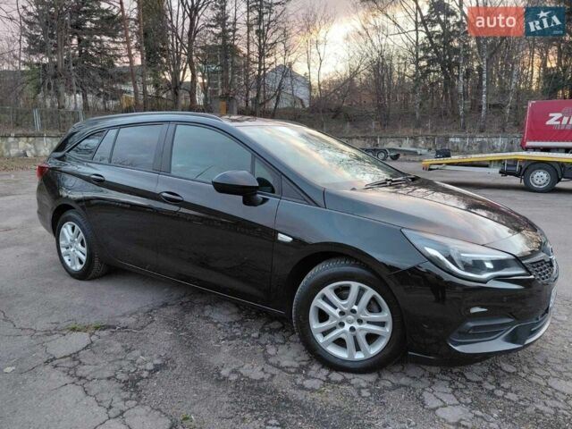 Чорний Опель Астра, об'ємом двигуна 1.5 л та пробігом 156 тис. км за 11899 $, фото 1 на Automoto.ua