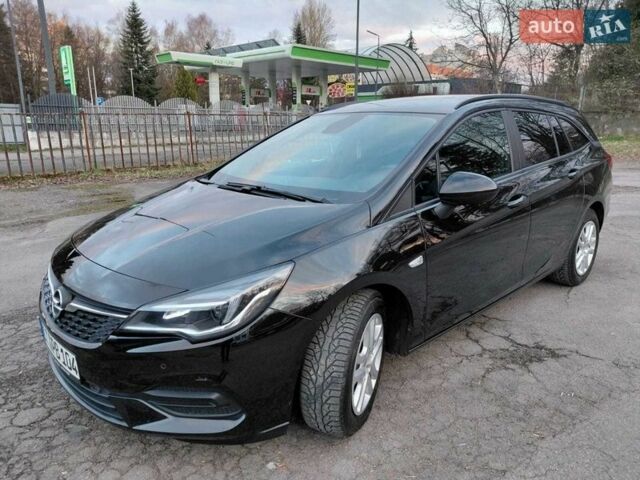 Черный Опель Астра, объемом двигателя 1.5 л и пробегом 156 тыс. км за 11999 $, фото 1 на Automoto.ua