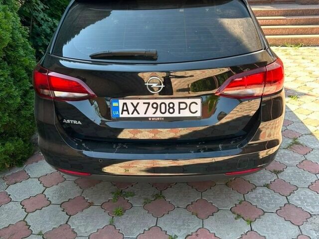 Чорний Опель Астра, об'ємом двигуна 1.5 л та пробігом 163 тис. км за 14059 $, фото 1 на Automoto.ua
