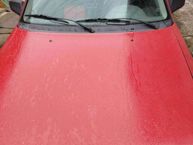 Красный Опель Астра, объемом двигателя 1.4 л и пробегом 40 тыс. км за 600 $, фото 1 на Automoto.ua