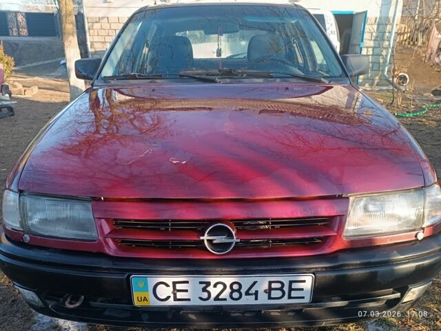 Красный Опель Астра, объемом двигателя 1.7 л и пробегом 330 тыс. км за 1500 $, фото 1 на Automoto.ua