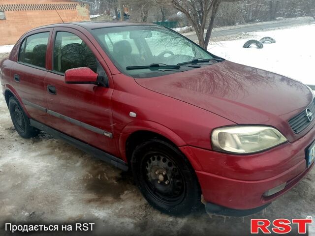 Красный Опель Астра, объемом двигателя 1.6 л и пробегом 250 тыс. км за 2700 $, фото 1 на Automoto.ua