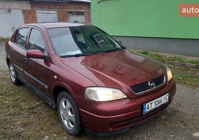 Красный Опель Астра, объемом двигателя 1.6 л и пробегом 250 тыс. км за 2700 $, фото 1 на Automoto.ua