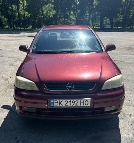 Красный Опель Астра, объемом двигателя 1.6 л и пробегом 272 тыс. км за 3500 $, фото 1 на Automoto.ua