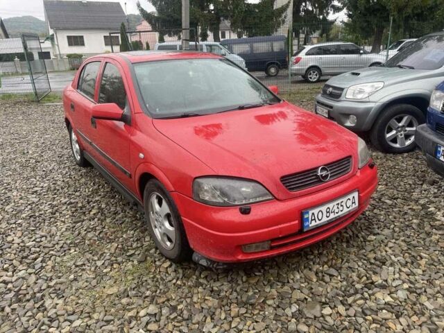 Красный Опель Астра, объемом двигателя 1.8 л и пробегом 300 тыс. км за 2200 $, фото 1 на Automoto.ua
