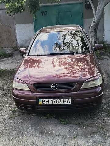 Червоний Опель Астра, об'ємом двигуна 1.39 л та пробігом 210 тис. км за 4400 $, фото 1 на Automoto.ua
