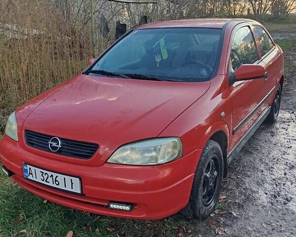 Красный Опель Астра, объемом двигателя 1.4 л и пробегом 264 тыс. км за 2700 $, фото 1 на Automoto.ua