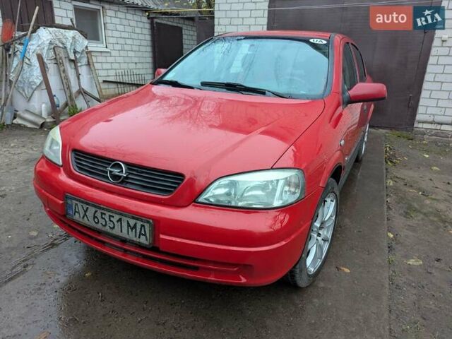 Красный Опель Астра, объемом двигателя 1.36 л и пробегом 207 тыс. км за 3650 $, фото 1 на Automoto.ua