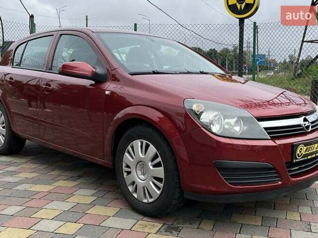 Красный Опель Астра, объемом двигателя 1.4 л и пробегом 233 тыс. км за 4999 $, фото 1 на Automoto.ua
