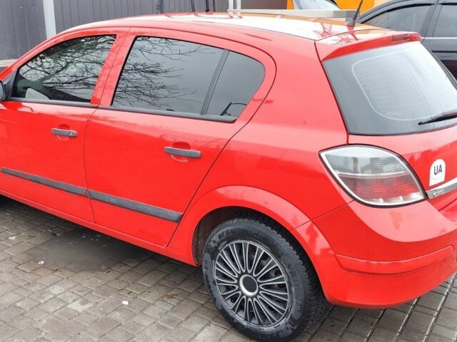 Красный Опель Астра, объемом двигателя 1.4 л и пробегом 198 тыс. км за 5200 $, фото 1 на Automoto.ua