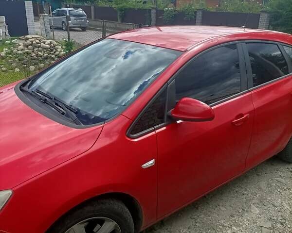 Красный Опель Астра, объемом двигателя 1.2 л и пробегом 200 тыс. км за 6000 $, фото 1 на Automoto.ua
