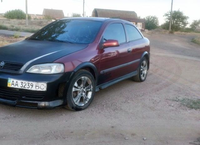 Красный Опель Астра, объемом двигателя 1.8 л и пробегом 150 тыс. км за 1201 $, фото 1 на Automoto.ua