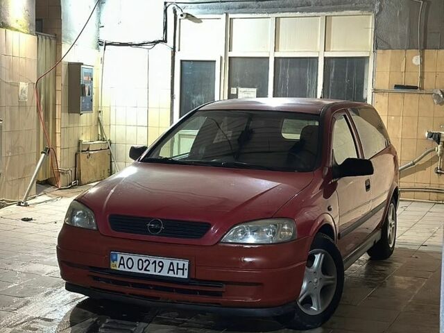 Красный Опель Астра, объемом двигателя 1.7 л и пробегом 270 тыс. км за 1750 $, фото 1 на Automoto.ua