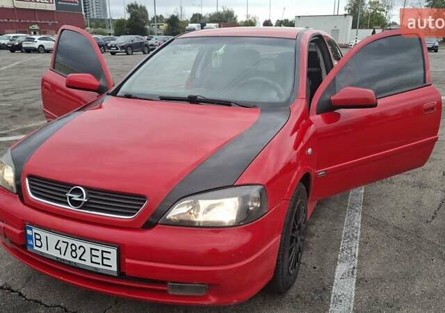 Красный Опель Астра, объемом двигателя 1.6 л и пробегом 220 тыс. км за 3300 $, фото 1 на Automoto.ua