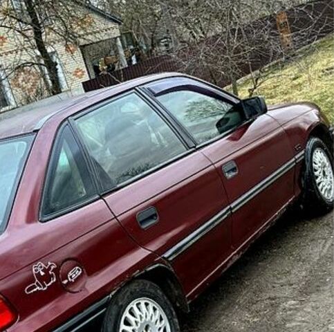 Красный Опель Астра, объемом двигателя 1.6 л и пробегом 492 тыс. км за 600 $, фото 1 на Automoto.ua