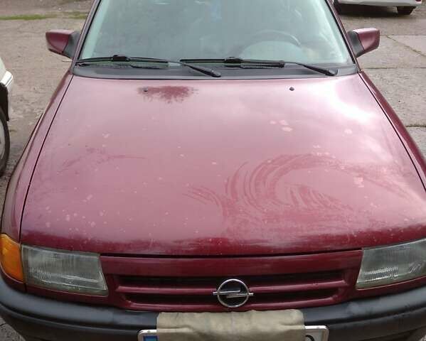 Червоний Опель Астра, об'ємом двигуна 1.4 л та пробігом 220 тис. км за 1800 $, фото 1 на Automoto.ua