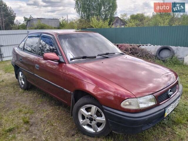 Красный Опель Астра, объемом двигателя 1.6 л и пробегом 223 тыс. км за 3300 $, фото 1 на Automoto.ua