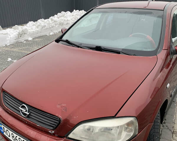 Красный Опель Астра, объемом двигателя 1.6 л и пробегом 280 тыс. км за 2500 $, фото 1 на Automoto.ua
