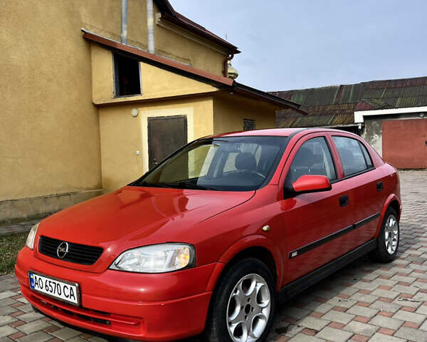 Червоний Опель Астра, об'ємом двигуна 1.6 л та пробігом 150 тис. км за 2950 $, фото 1 на Automoto.ua