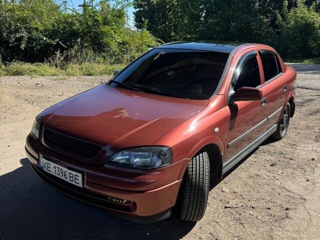 Красный Опель Астра, объемом двигателя 1.6 л и пробегом 309 тыс. км за 4800 $, фото 1 на Automoto.ua