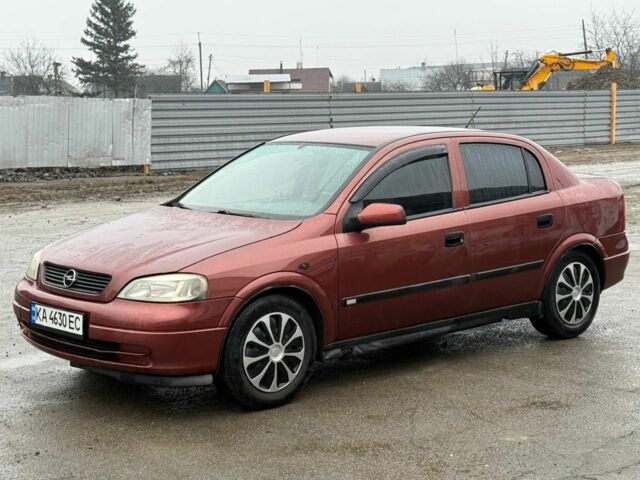 Красный Опель Астра, объемом двигателя 1.8 л и пробегом 300 тыс. км за 3500 $, фото 1 на Automoto.ua