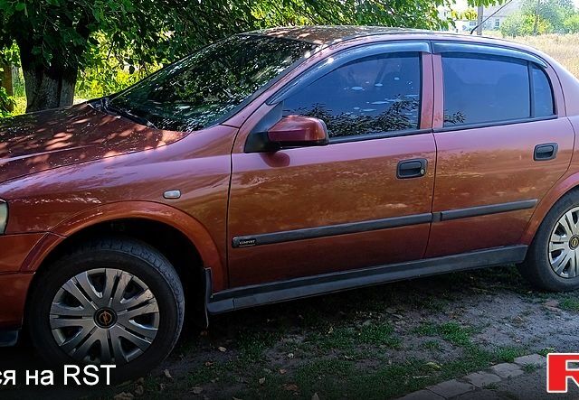Червоний Опель Астра, об'ємом двигуна 1.4 л та пробігом 287 тис. км за 3100 $, фото 1 на Automoto.ua