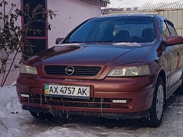 Червоний Опель Астра, об'ємом двигуна 1.4 л та пробігом 288 тис. км за 3100 $, фото 1 на Automoto.ua