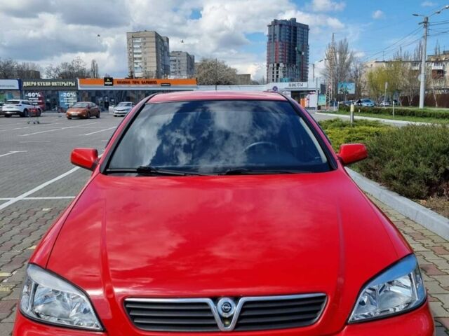 Красный Опель Астра, объемом двигателя 1.6 л и пробегом 224 тыс. км за 4500 $, фото 1 на Automoto.ua
