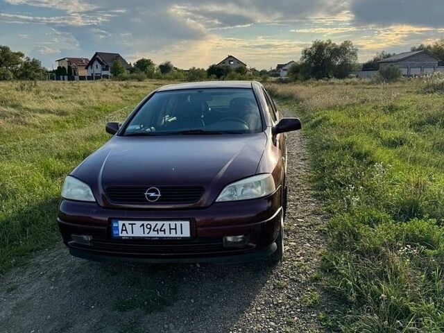 Красный Опель Астра, объемом двигателя 1.4 л и пробегом 188 тыс. км за 3500 $, фото 1 на Automoto.ua