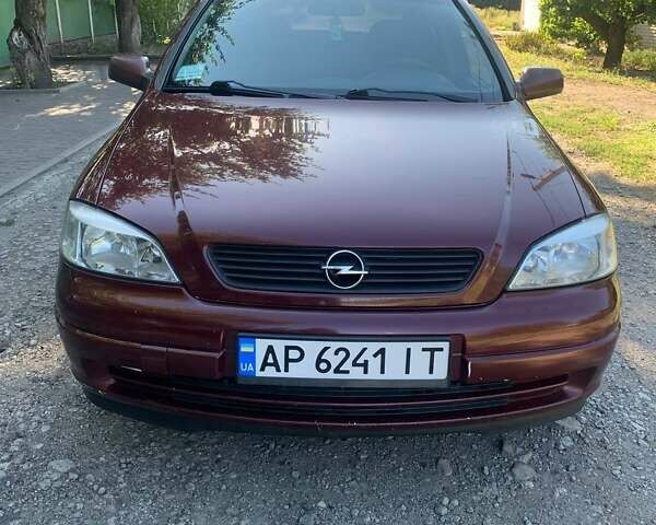 Червоний Опель Астра, об'ємом двигуна 1.6 л та пробігом 285 тис. км за 3200 $, фото 1 на Automoto.ua