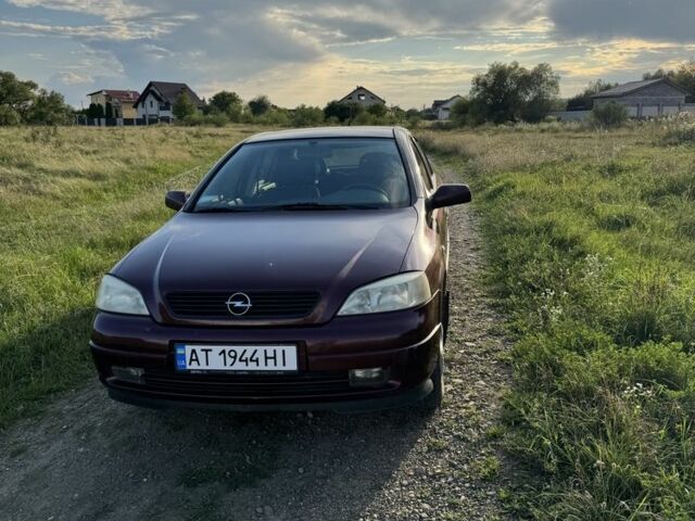 Красный Опель Астра, объемом двигателя 1.4 л и пробегом 183 тыс. км за 3421 $, фото 1 на Automoto.ua