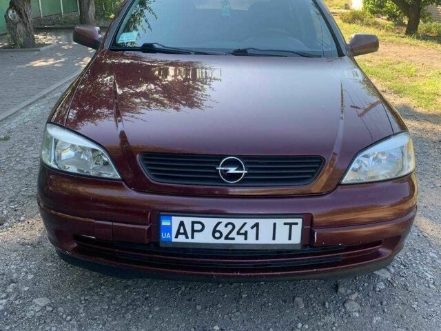 Красный Опель Астра, объемом двигателя 1.6 л и пробегом 285 тыс. км за 3000 $, фото 1 на Automoto.ua
