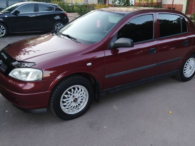 Червоний Опель Астра, об'ємом двигуна 1 л та пробігом 412 тис. км за 3600 $, фото 1 на Automoto.ua