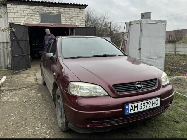 Красный Опель Астра, объемом двигателя 1.4 л и пробегом 208 тыс. км за 3900 $, фото 1 на Automoto.ua