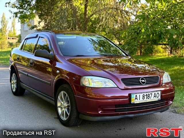 Червоний Опель Астра, об'ємом двигуна 1.4 л та пробігом 180 тис. км за 4000 $, фото 1 на Automoto.ua