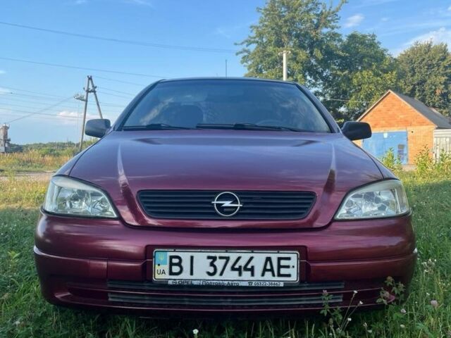 Червоний Опель Астра, об'ємом двигуна 1.4 л та пробігом 400 тис. км за 2704 $, фото 1 на Automoto.ua
