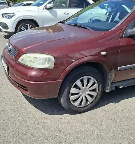 Червоний Опель Астра, об'ємом двигуна 1.39 л та пробігом 121 тис. км за 3700 $, фото 1 на Automoto.ua
