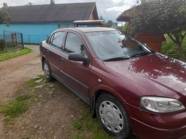 Красный Опель Астра, объемом двигателя 1.4 л и пробегом 250 тыс. км за 3700 $, фото 1 на Automoto.ua