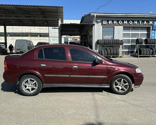 Червоний Опель Астра, об'ємом двигуна 1.4 л та пробігом 150 тис. км за 3700 $, фото 1 на Automoto.ua