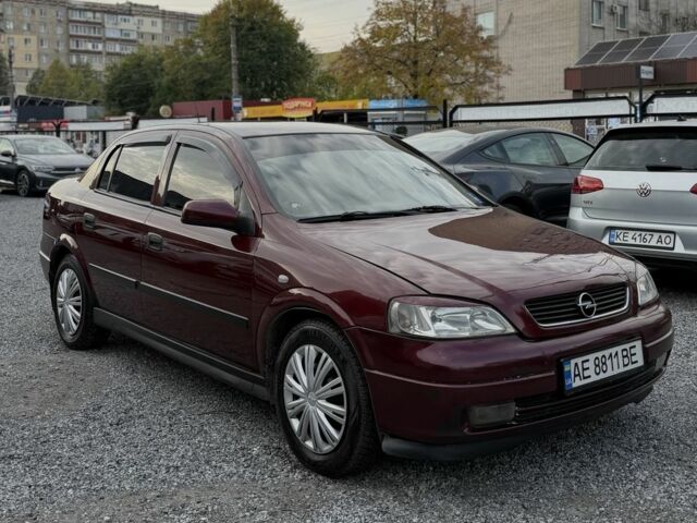 Красный Опель Астра, объемом двигателя 1.6 л и пробегом 265 тыс. км за 3588 $, фото 1 на Automoto.ua