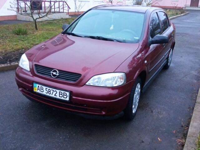 Красный Опель Астра, объемом двигателя 1.4 л и пробегом 160 тыс. км за 3500 $, фото 1 на Automoto.ua