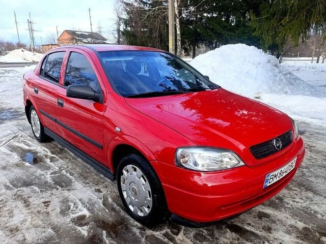 Червоний Опель Астра, об'ємом двигуна 1.4 л та пробігом 213 тис. км за 1309 $, фото 1 на Automoto.ua