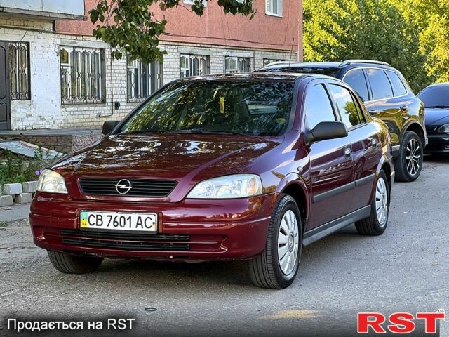 Красный Опель Астра, объемом двигателя 1.6 л и пробегом 204 тыс. км за 3900 $, фото 1 на Automoto.ua
