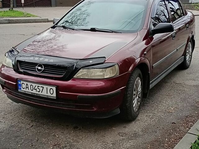 Красный Опель Астра, объемом двигателя 1.6 л и пробегом 183 тыс. км за 4200 $, фото 1 на Automoto.ua
